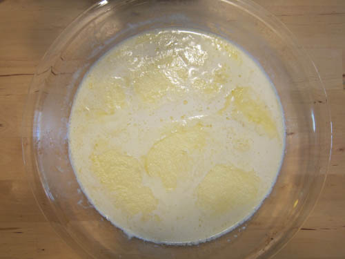 heavy cream on glass baking dish covered with foil