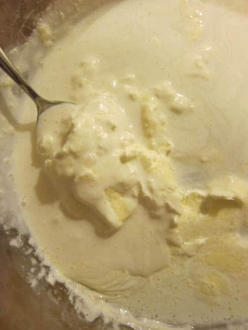soupy clotted cream on a spoon 