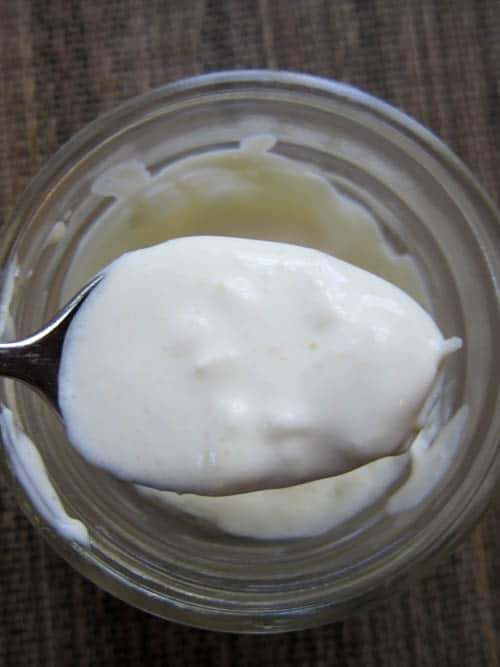 spoonful of smooth but runny clotted cream