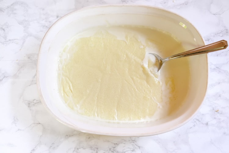 clotted cream in a white baking dish 