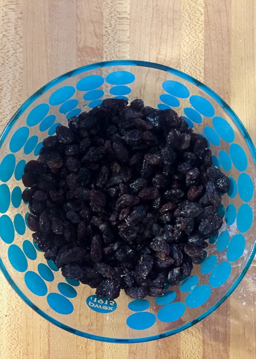 mix of raisins on a glass bowl