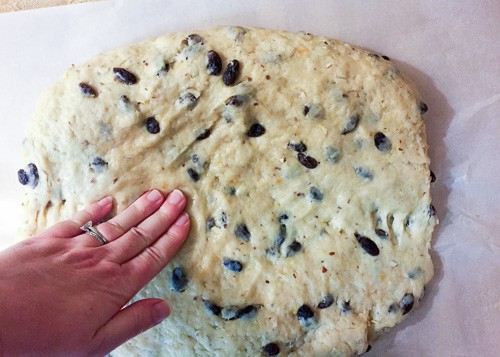 Pressing the Stollen dough in the center using fingers