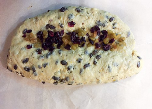 Stollen dough with dried fruits in the middle