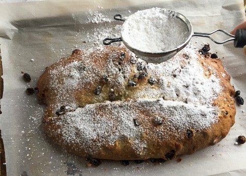 Stollen bread with sifted powdered sugar on top