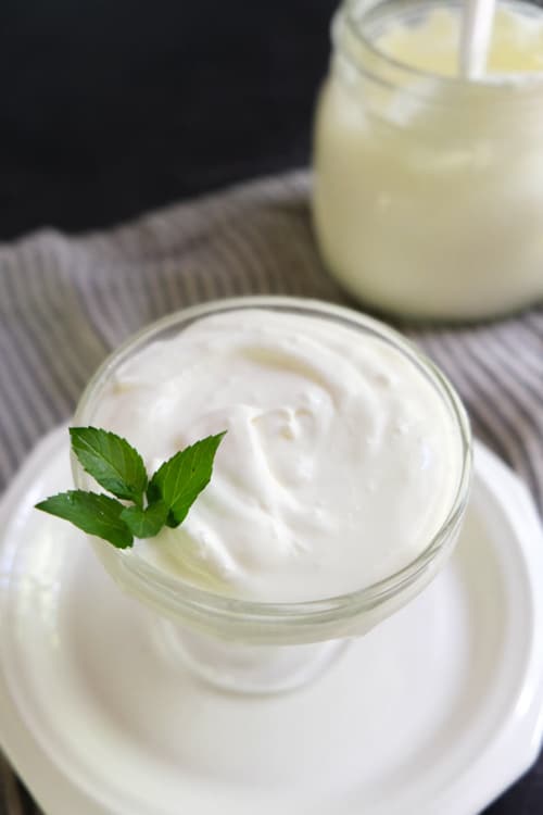 homemade crème frâiche in a glass and jar