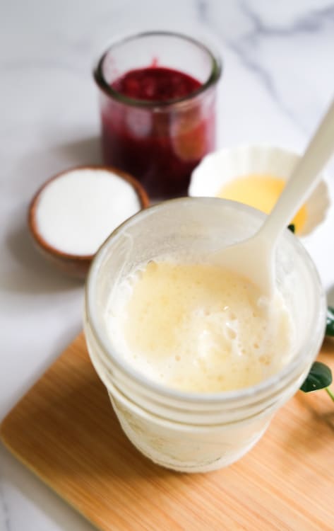 golden syrup ice cream in a glass with spoon