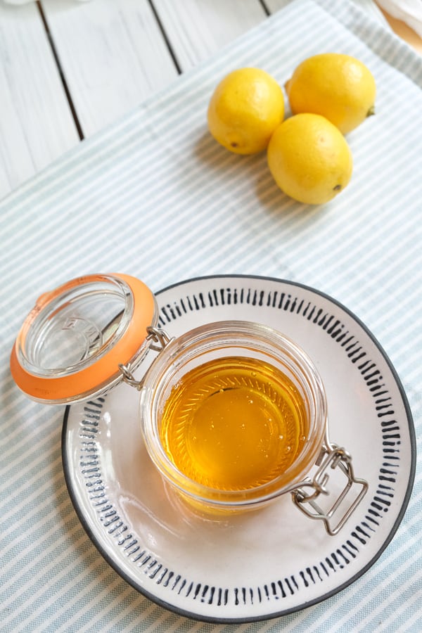 top view of golden syrup in a jar with open lid