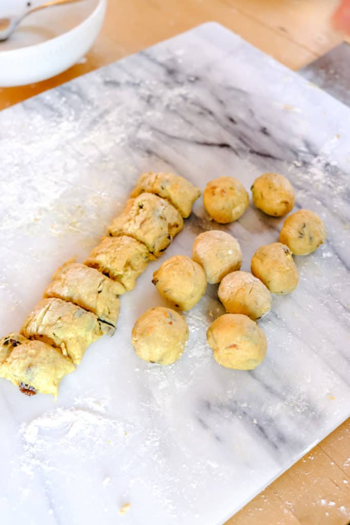 Stollen dough divided into bites and rolled into balls