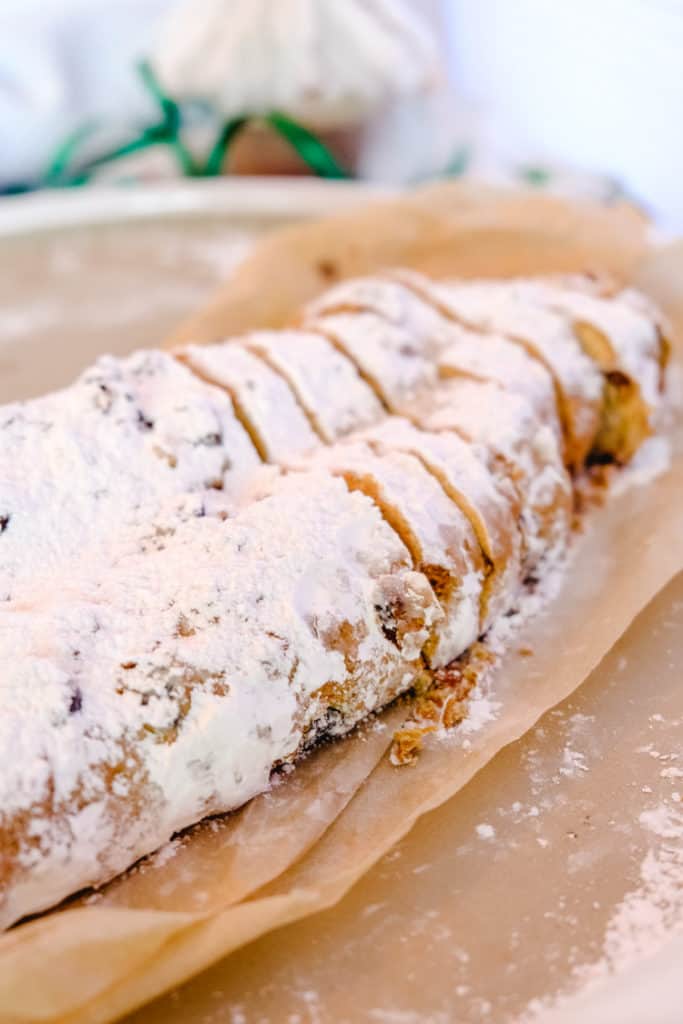 a loaf of German Stollen slathered with powdered sugar