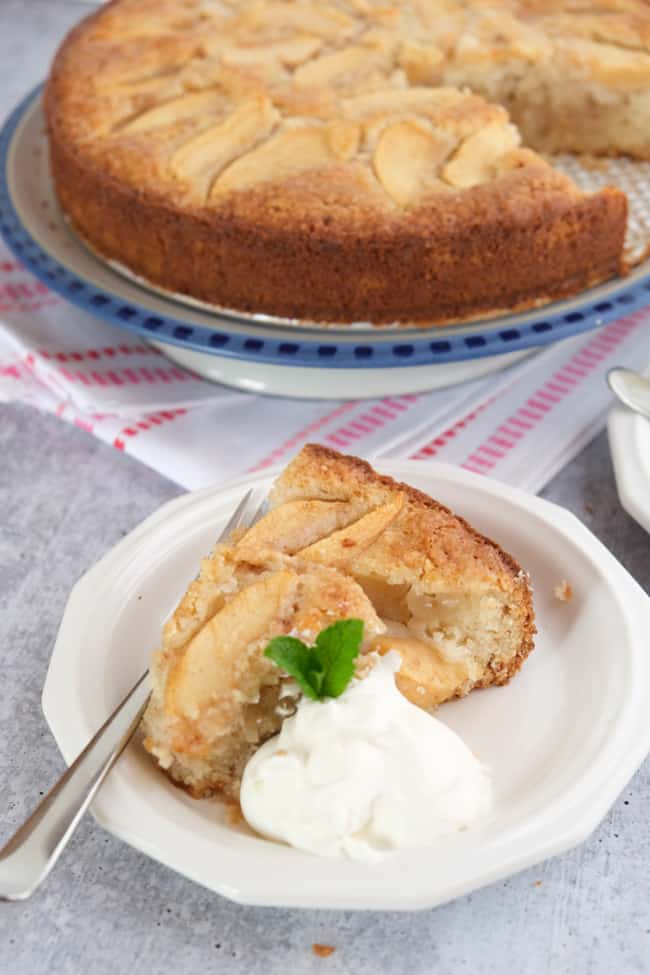 German apple custard cake with whipped cream 