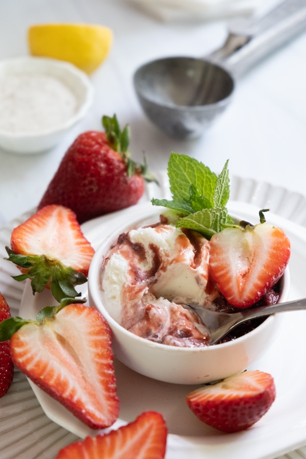 roasted strawberries with vanilla ice cream in cup