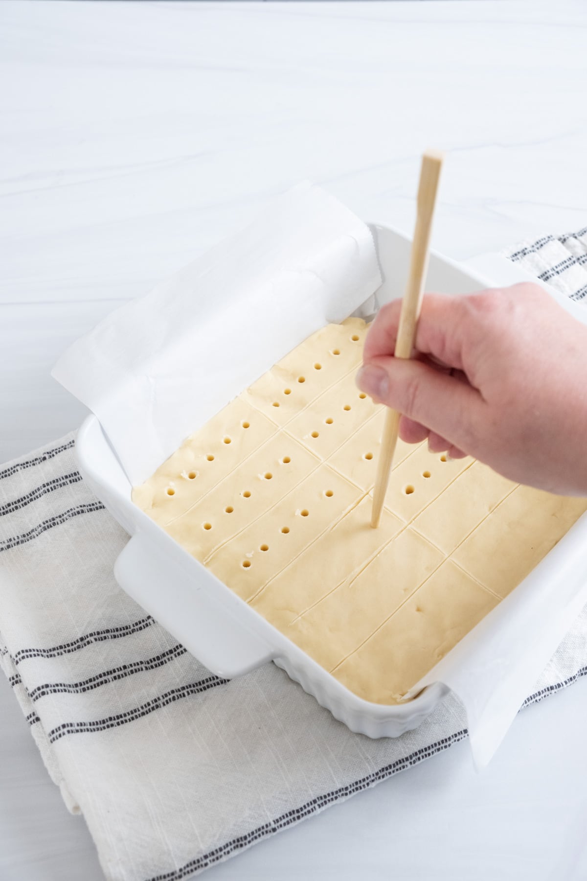 pressing chopstick into each bar