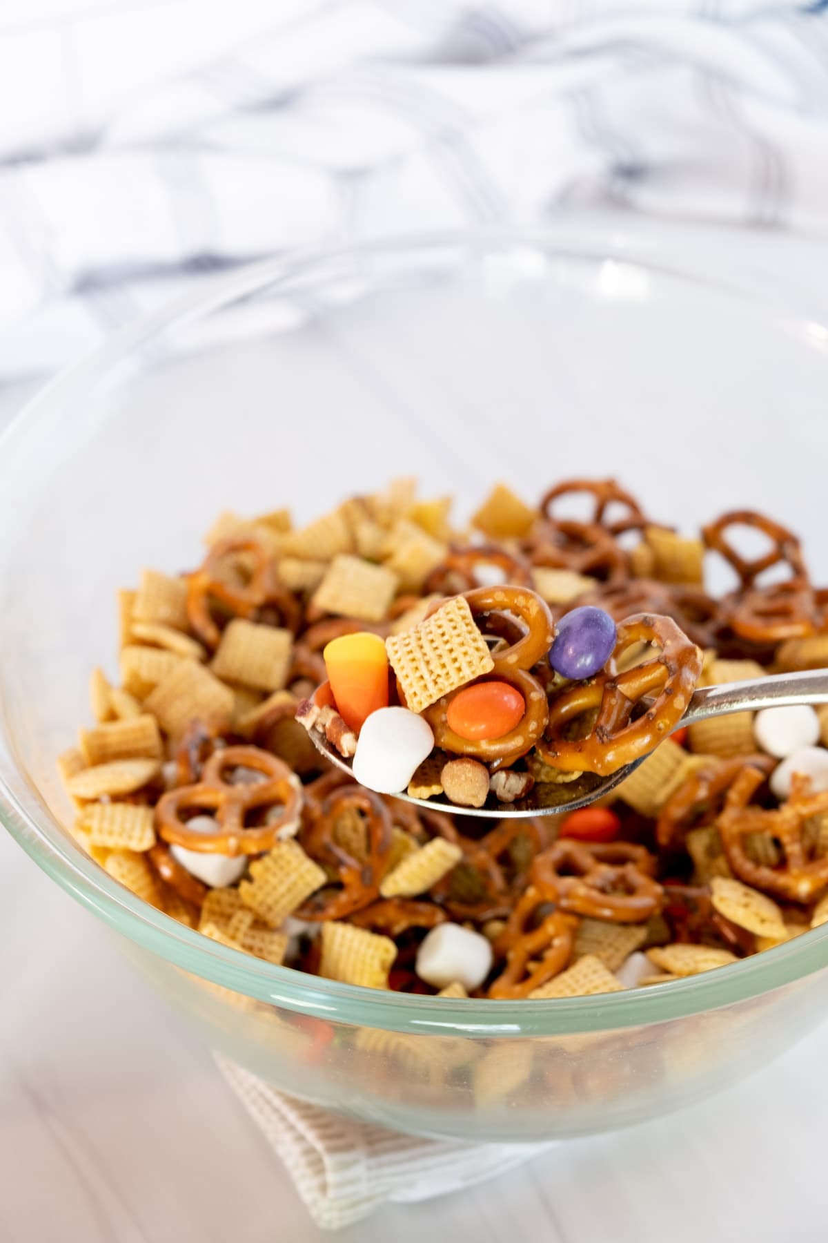 a scoop of Halloween chex mix